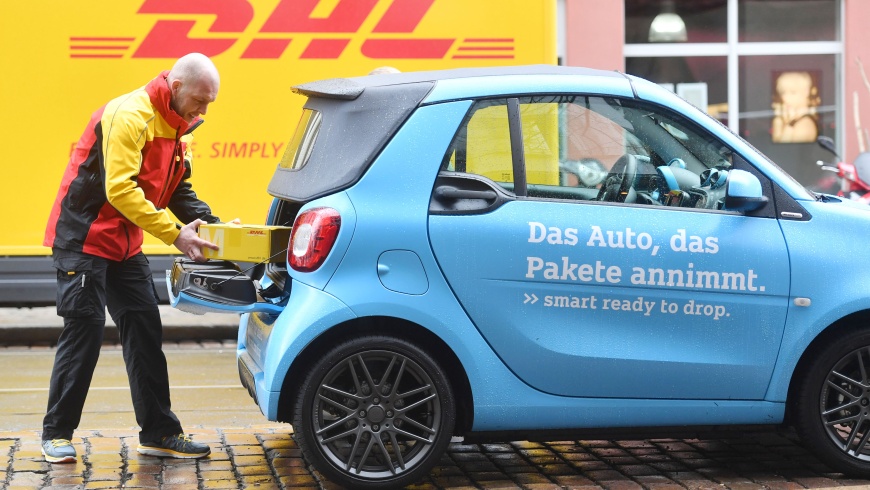DHL/smart Kofferraum-Zustellung